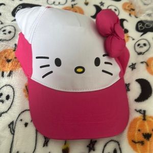 Pink hello kitty hat brand new still on plastic